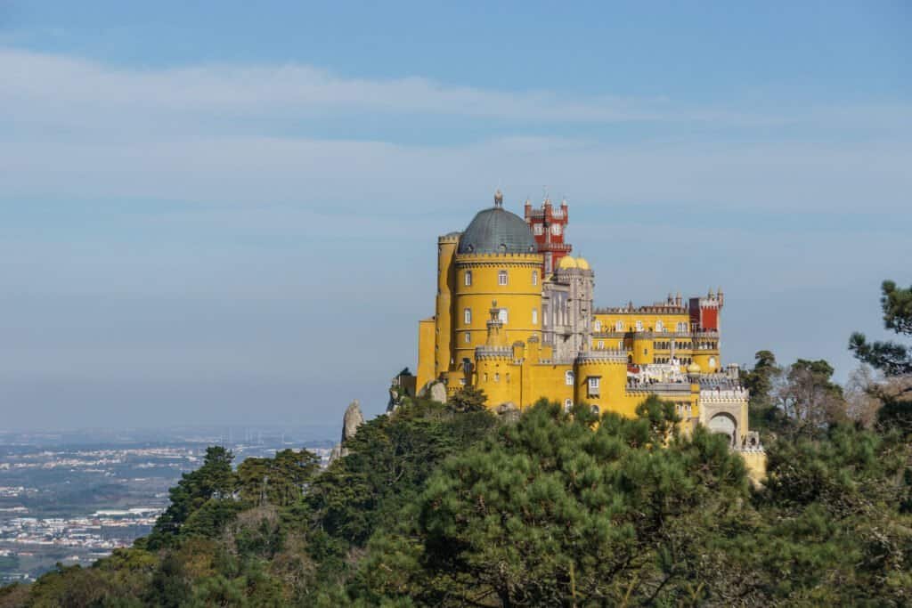 Palace of penaon top of a hill between forest in sintra. Lisbon, portugal
