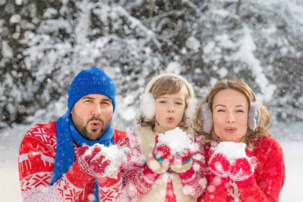 Family in snow in australia