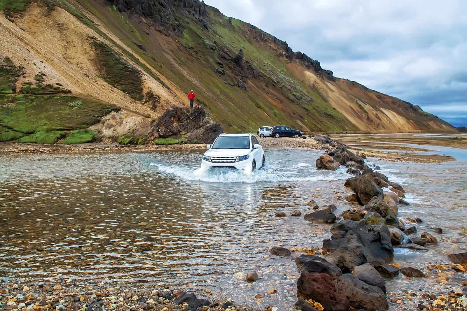 Jeep crossing a river in iceland