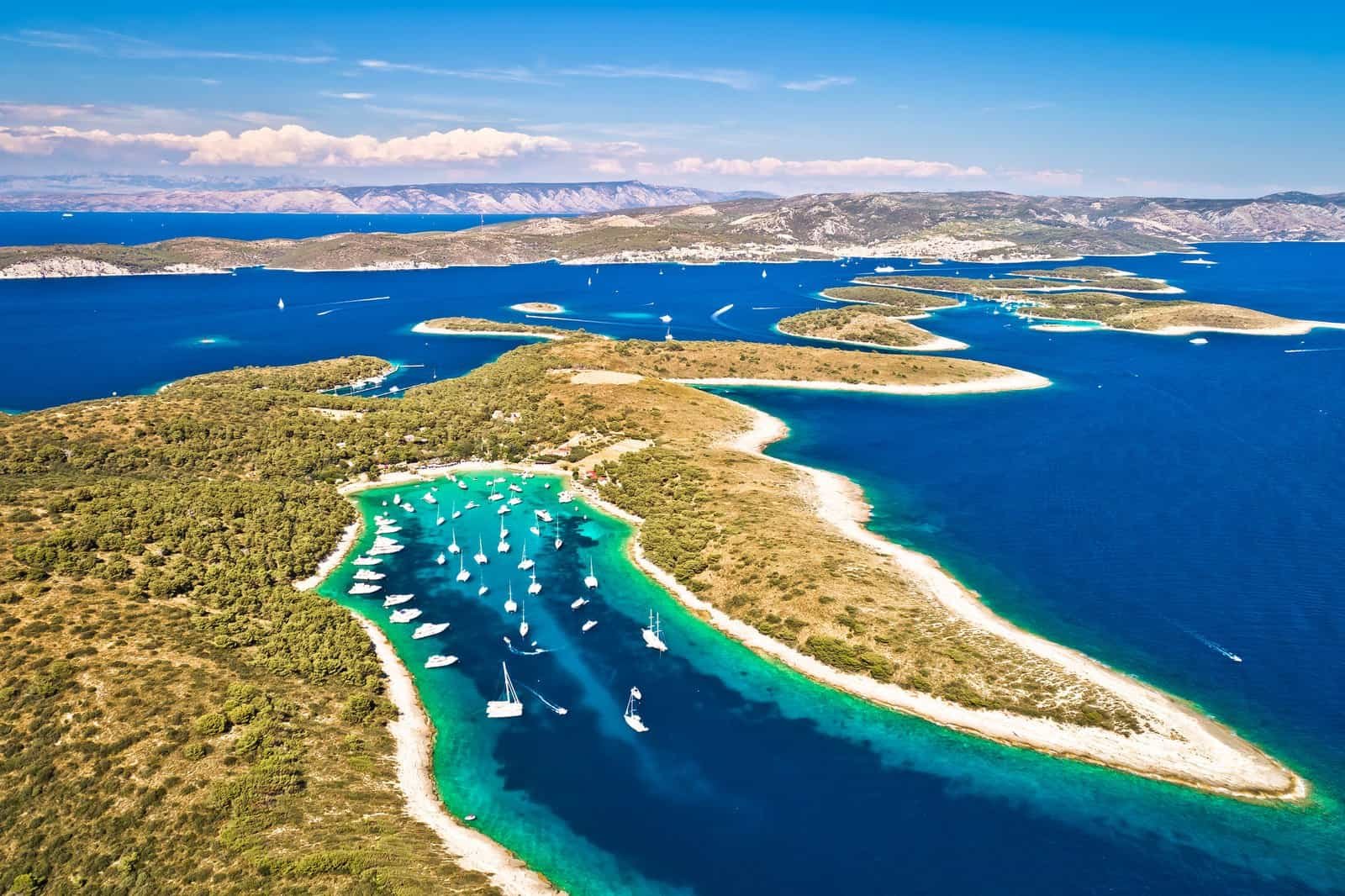 Aerial panoramic view of palmizana, sailing cove and turquoise beach on pakleni otoci islands, archipelago of hvar in croatia